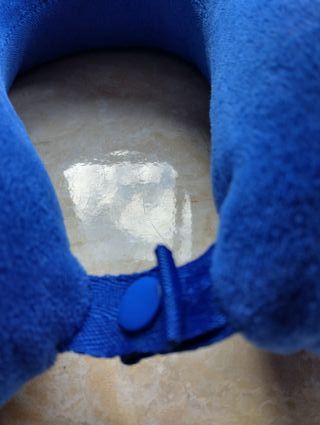 Almohada de viaje azul para cuello