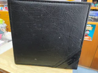 Álbum negro de cuero sintético