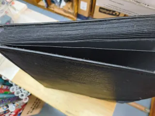 Álbum negro de cuero sintético