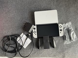 Nintendo Switch OLED en garantía.