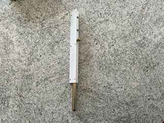 Tope de puerta metálico