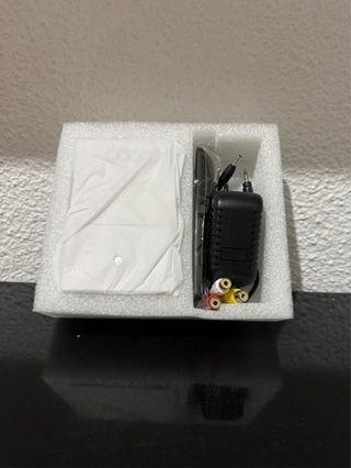 Mini proyector LED blanco con mando