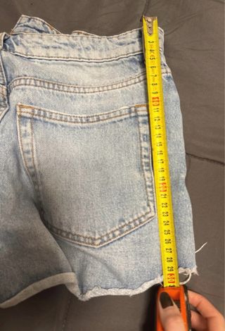 Pantaloncini jeans strappati donna