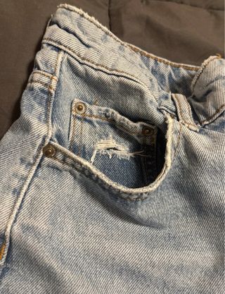 Pantaloncini jeans strappati donna