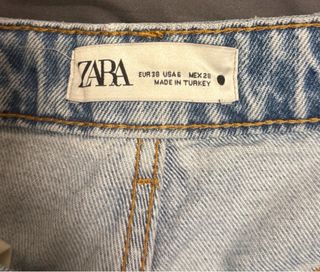 Pantaloncini jeans strappati donna