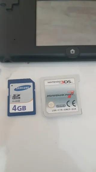 Nintendo 2DS Negra + Juegos TMNT mario