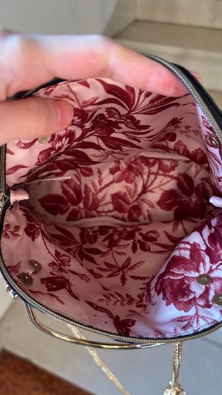 Pochette Gucci nera con catena oro