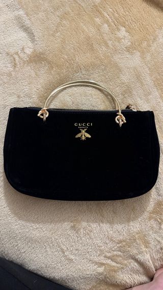 Pochette Gucci Beauty nera con ape dorata