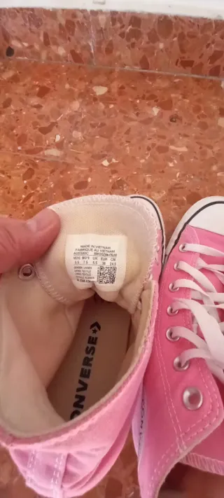 Zapatillas Converse rosas altas con poco uso.