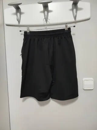 Pantalón corto deportivo negro hombre