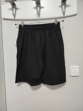 Pantalón corto deportivo negro hombre