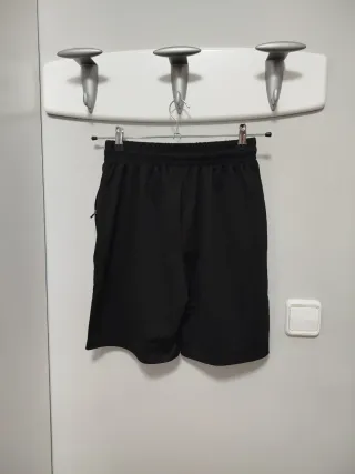 Pantalón corto deportivo negro hombre