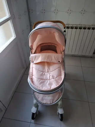 Carrito bebé rosa y blanco