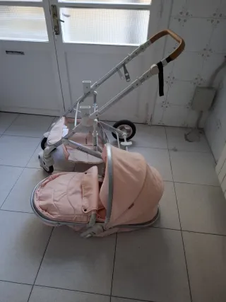 Carrito bebé rosa y blanco