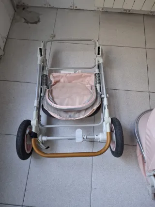 Carrito bebé rosa y blanco