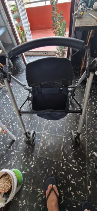 Silla de ruedas y tacataca