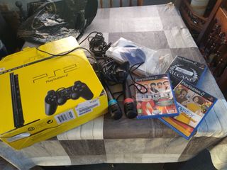 PlayStation 2 + 2 micros + 3 juegos karaoke