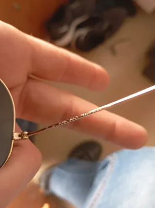 Gafas de sol Ray-Ban doradas y verdes