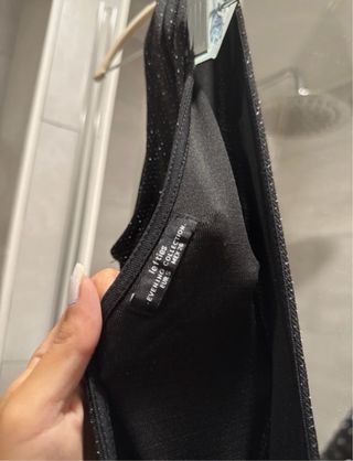 Mono brillante negro y plateado