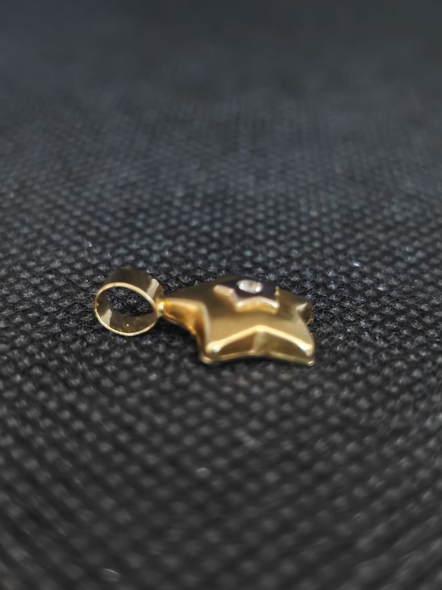 Colgante oro 18k estrella circonita 051-03-00500