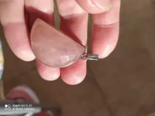 Dos colgantes de plata cuarzo y focil