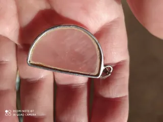 Dos colgantes de plata cuarzo y focil