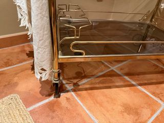 Camerino de cristal y metal dorado