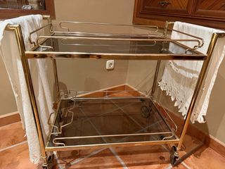 Camerino de cristal y metal dorado