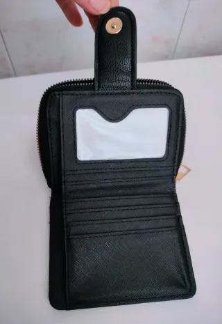 Monedero negro acolchado