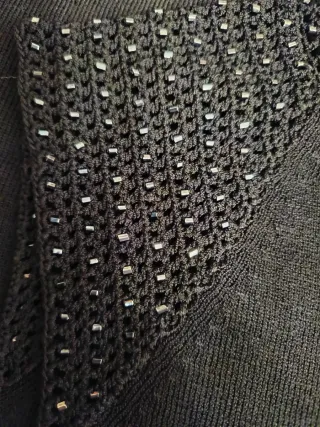 Top negro con brillos