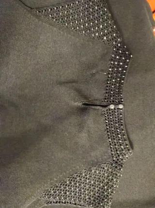 Top negro con brillos