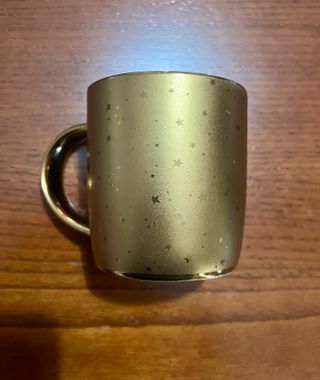 Tazza oro con stelle