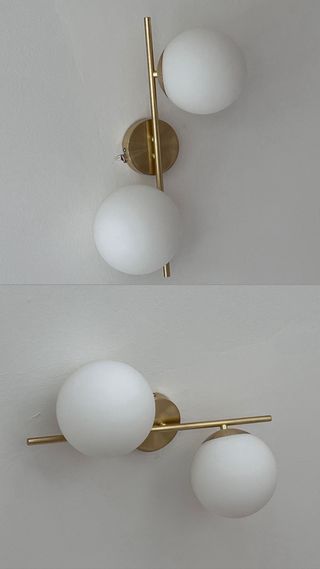 Lámpara de pared dorada con 2 esferas
