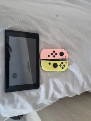 Nintendo Switch Rosa y Amarillo