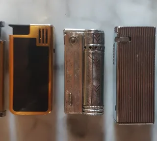 Lotto di 7 accendini vintage Ronson e altro