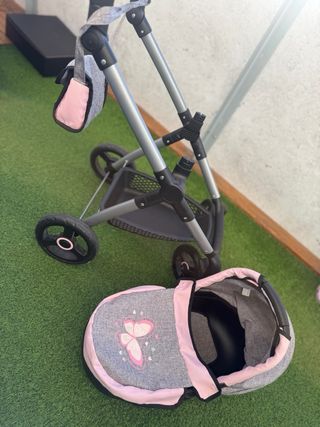 Carritos de bebé de juguete gris y rosa