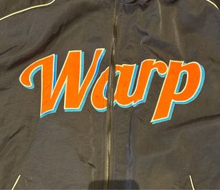 Giacca bomber blu e arancione