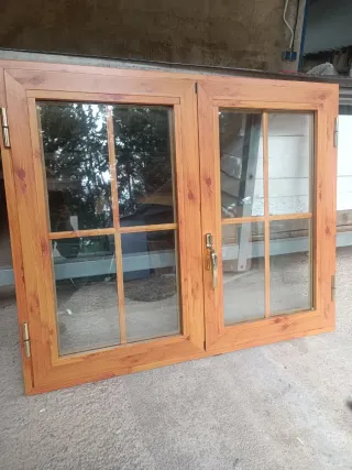 Ventana abatible color pino nudo y cristal doble