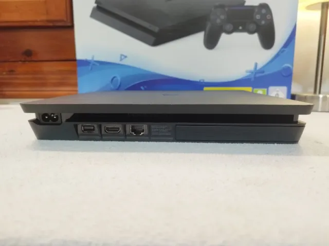 PS4 Slim 500GB + 10 Juegos + Mando Azul