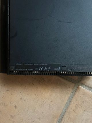Consola PS3 Negra con 3 Juegos y 2 Mandos