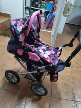 Carrito de muñecas rosa y azul