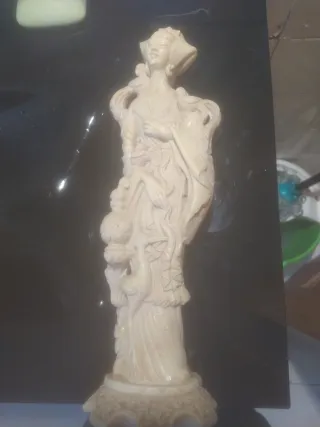 Pareja figuras decorativas