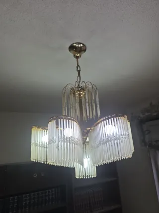 Lámparas de salón doradas y transparentes