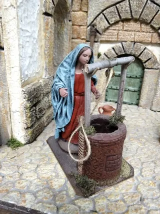 Pastora con pozo y cántaro