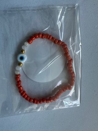 Pulseira Olho Grego Laranja e Dourada