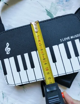 Borsa a tracolla con tastiera pianoforte