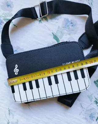 Borsa a tracolla con tastiera pianoforte