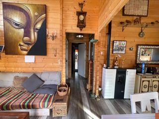 Venta de terreno urbano con casa de madera