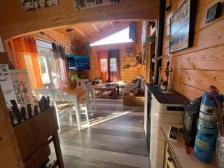 Venta de terreno urbano con casa de madera