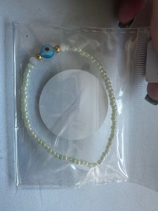 Pulseira de proteção olho grego dourada